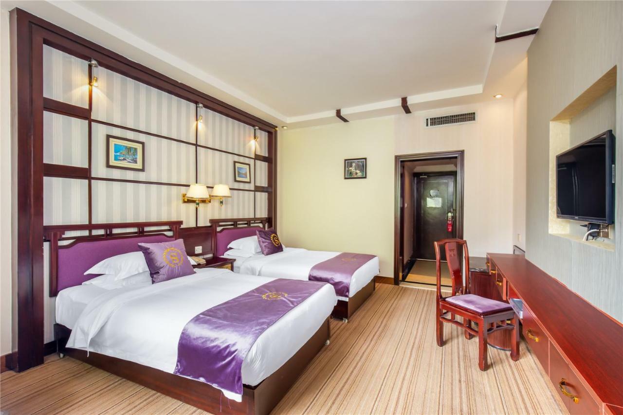 יאנג שואו New Century Hotel מראה חיצוני תמונה